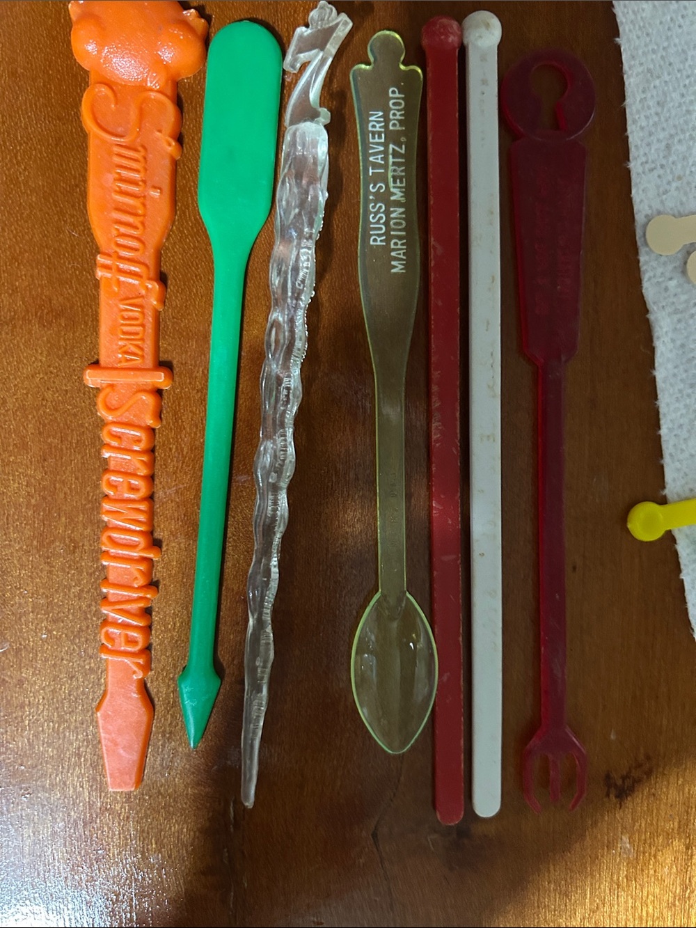 Set of 7 vintage beverage stirrers.